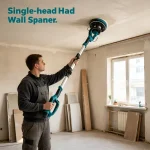 High-reach drywall sanding with dust extractor – worker on scaffolding sanding near ceiling, vacuum system capturing debris.